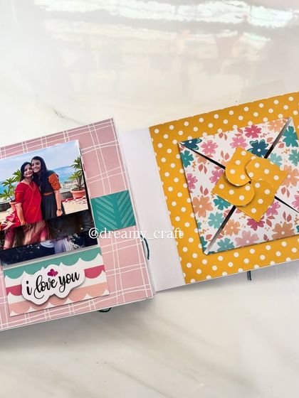 This page features a pinwheel-style fold-out element that can hide more photos or messages, adding a fun, interactive touch.