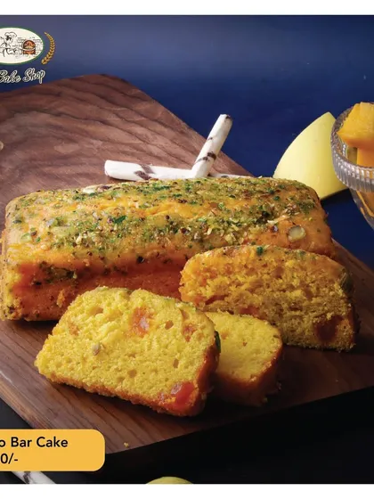 A closer look at our Mango Bar Cake, showcasing the chunks of real mango baked into the loaf.
