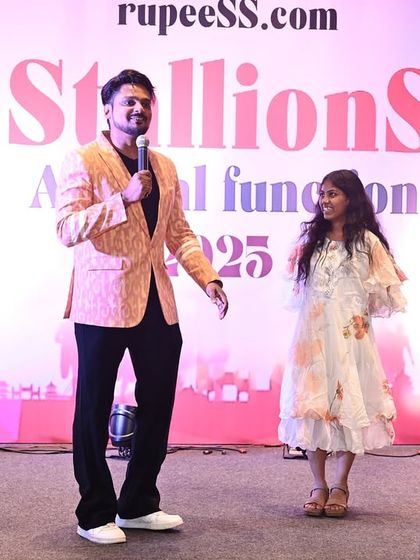 Engaging with a guest during the Stallions annual function. I make it a point to connect with individuals, ensuring everyone feels seen and included in the celebration.