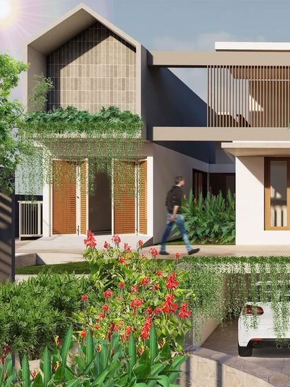 This design for a home in Mangalore focuses on passive cooling strategies. The use of skylights for natural light, jaali work for ventilation, and breezeways for airflow helps reduce energy consumption while creating a pleasant living environment.