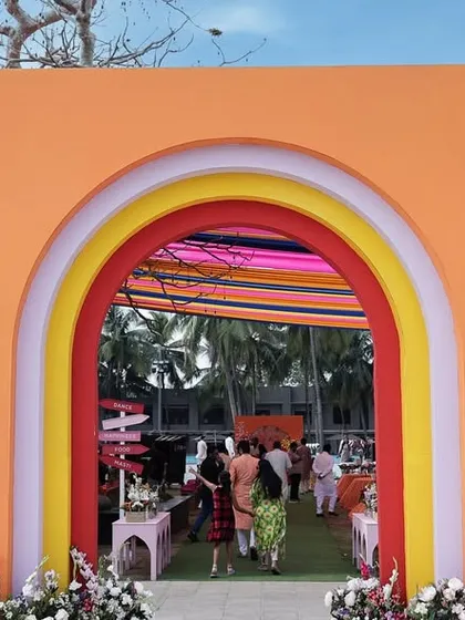 The rainbow-arched entrance to our 'Spectrum of Love' Haldi. This colorful gateway immediately sets a tone of joy and celebration for the guests arriving.