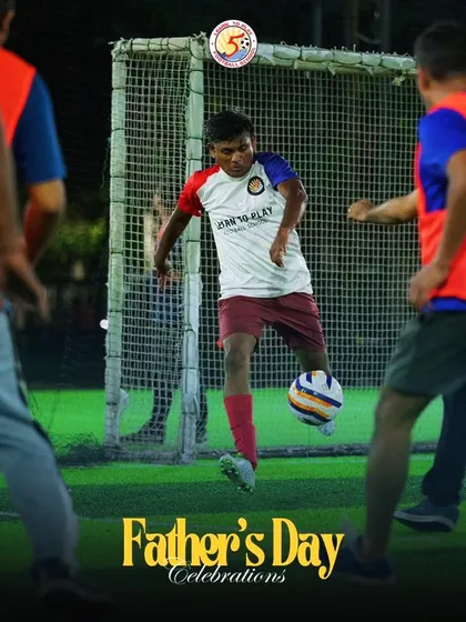 A player from our academy dribbling the ball during the Father's Day event.