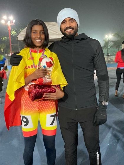 Celebrating a student's victory at the 59th National Championship. Her dedication during our inline skate power workouts paid off.