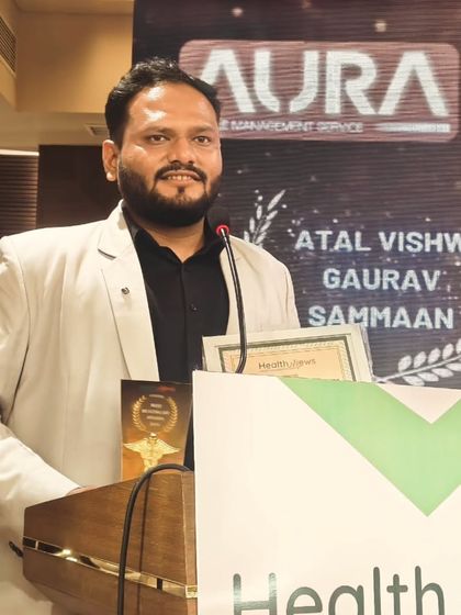 Speaking at the podium after receiving the award. I took the opportunity to thank everyone who has been a part of my journey and to reaffirm my commitment to holistic healing.