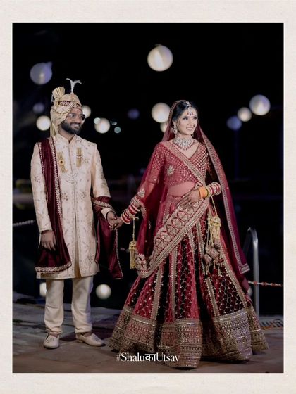 Another beautiful full-length shot of the couple, their traditional outfits and loving hold making for a perfect wedding portrait.