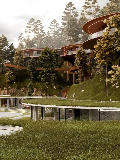 The resort's lower buildings feature green roofs, further blending the architecture into the natural landscape.