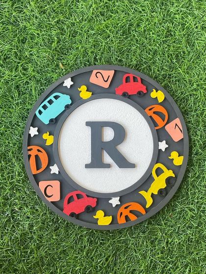 Another take on our toy-themed monogram, this time for the letter "R". These kits are a great way to create a truly personal and meaningful piece of art.