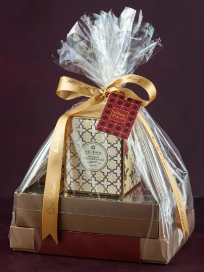 Our Diwali Signature Hamper is thoughtfully curated to be the perfect festive gift, complete with handmade chocolates, fresh desserts, and a scented candle.