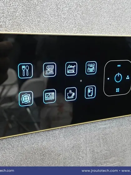 This is the centerpiece of a truly personalized smart home. Our premium JR XION touch panel, shown here with a custom gold frame and a wide array of icons, gives you granular control over every aspect of a room, from lighting scenes to appliances, all from one elegant interface.