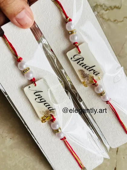 Custom resin Rakhis with names, perfect for celebrating the bond of sibling love.