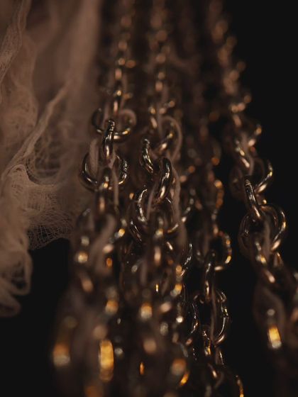 Close up on the chains used in the 'MEDEA' set. I used metallic, clashing, and scraping sounds in the score to echo these visuals, making the soundscape feel tangible and threatening.