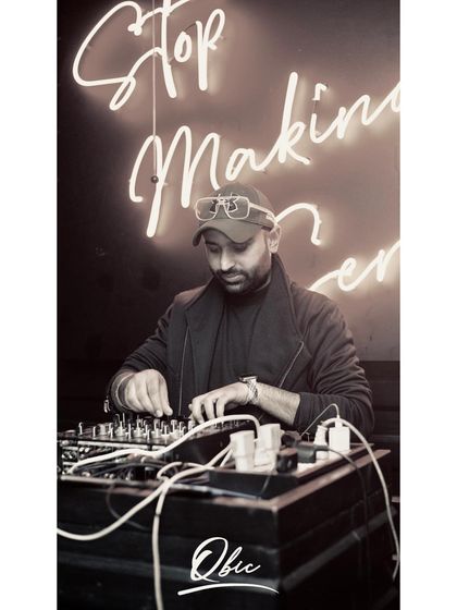 Performing under a neon sign that says "Stop Making Sense". Sometimes, the best parties are the ones where you just let go and enjoy the music without overthinking it.