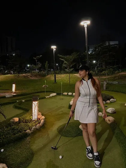 Styling a sporty and polished golf outfit from NewMe. This shows my ability to create content for niche lifestyle activities, blending fashion with sports.