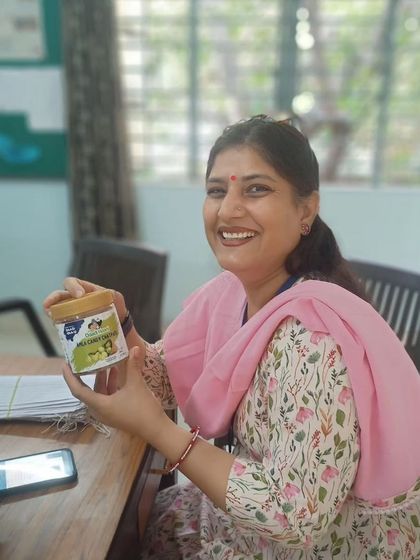 A bright smile and a jar of our Amla Candy. We are so grateful for customers who not only enjoy our products but also share their happiness with us.