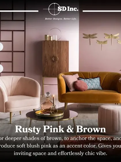 This image showcases a chic and inviting space using a rusty pink and brown color palette. The soft blush tones in the armchair and ottoman are anchored by the deeper brown of the loveseat and cabinet.