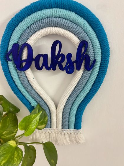 Introducing my parachute-style name hanging for Daksh. The cool blue tones create a calming effect, making it a wonderful piece of decor for a baby boy's nursery or playroom.