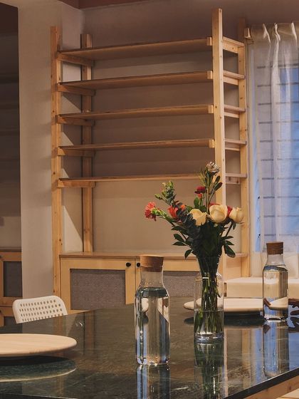 Fresh flowers on the table are a small detail, but they bring life and color into the studio, reminding us to find beauty in the simple things.