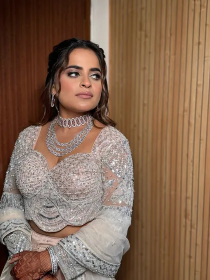 A powerful and glamorous look for an engagement party. The smokey eye and perfectly sculpted features create a look that is both modern and timelessly chic.