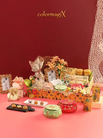 A wider view of the Teej hamper, showcasing its generous size and the variety of gifts included, from edible treats to keepsake items.