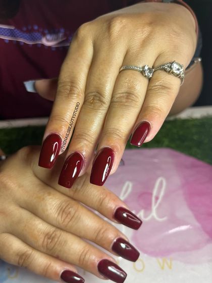 Another look at these stunning, glossy red nails.