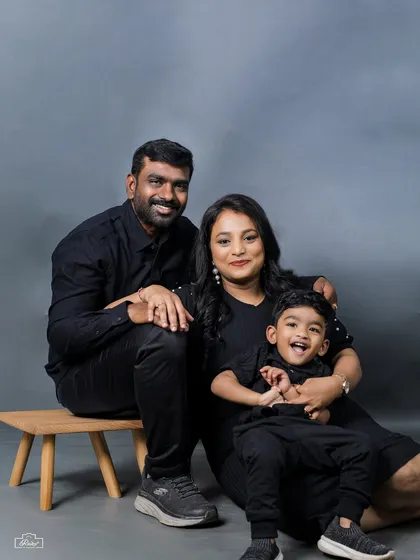 A candid moment of laughter from a family of three during their studio session. We believe the best family portraits are the ones filled with real emotion and connection.