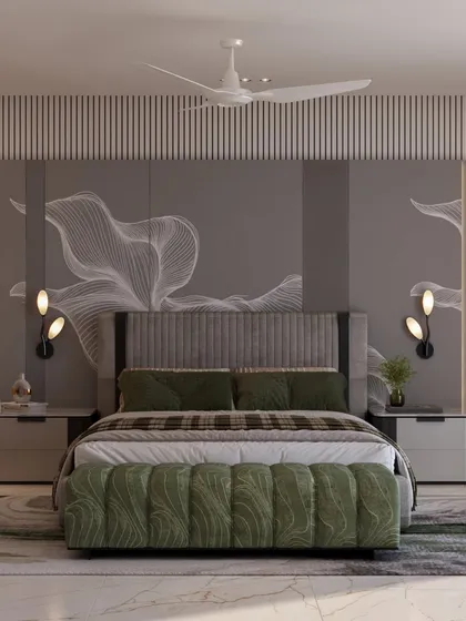 This master bedroom balances calm and character. A soft grey backdrop and a statement wallpaper behind the bed set a modern, artistic tone, while accents of deep green in the bench and bedding bring freshness and life.