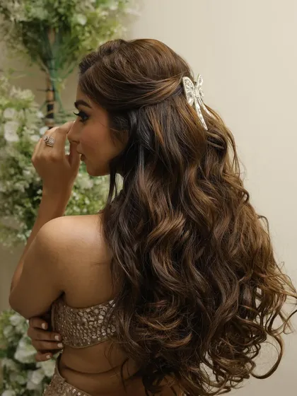 A side view of this beautiful hairstyle, showing how the accessory is perfectly placed to enhance the look.