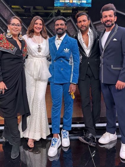 Celebrity Jay Bhanushali spotted on set wearing our bespoke black blazer with a contrasting white striped lapel. A sharp and modern look for television.