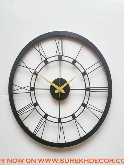 This vintage-style wall clock features a detailed Roman numeral design in a solid black finish. The classic aesthetic is perfect for adding a touch of traditional charm to a modern or transitional space.
