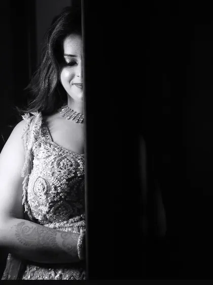 A dramatic black and white photo, creating a sense of mystery and elegance.