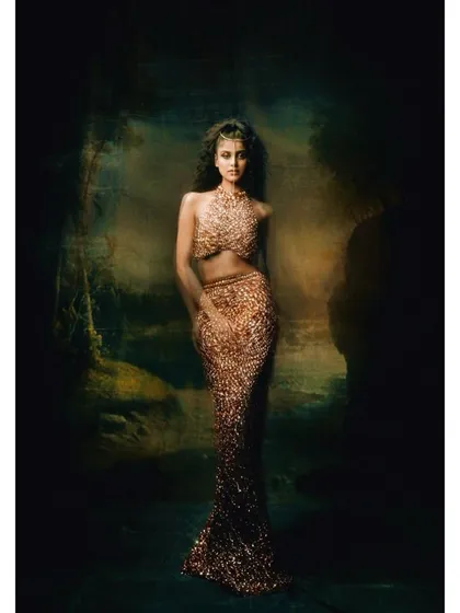 A painterly portrait from my "Judith" series. This image showcases my fine art approach to photography, using dramatic lighting and a textured background to create a mood that feels timeless. This style is perfect for brands and subjects wanting a classic, artistic feel.