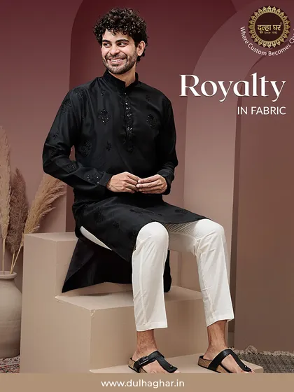 The classic black kurta set is a testament to timeless style. I crafted this piece from premium fabric to ensure it's not just elegant but also comfortable, making it a versatile staple for any festive occasion.