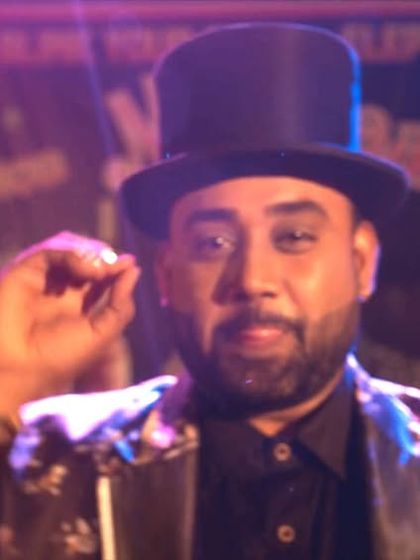 A close-up shot of me in character as 'Magician Yogi' for the web series. The top hat and costume really helped me get into the role.