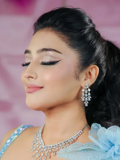 A close-up of the glittery eye makeup, which is the highlight of this creative look.