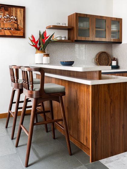 Pieces from the Dhara Residence, including the Ruba Bar Chair, Sirutha console, and Ruba armchair. This project highlights our ability to create contemporary yet warm furniture that complements modern architecture.