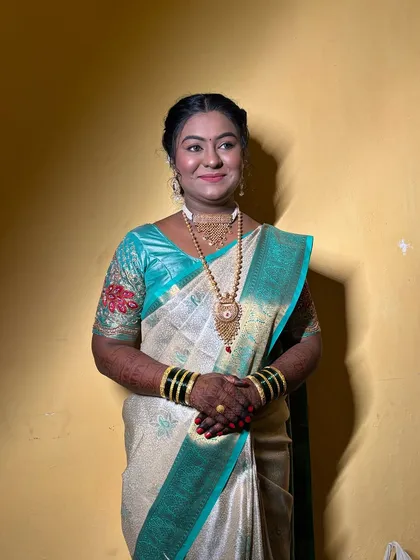 A full-length shot of the bride, looking confident and beautiful.