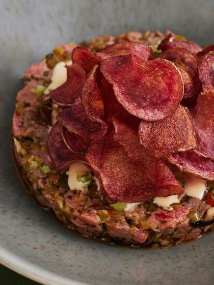 A Plats classic: Seared Steak Tartare. We serve it with a pommery mustard relish, pickled chilies for a bit of heat, and beautiful, crispy mulberry potato chips.