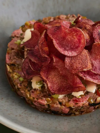 A Plats classic: Seared Steak Tartare. We serve it with a pommery mustard relish, pickled chilies for a bit of heat, and beautiful, crispy mulberry potato chips.