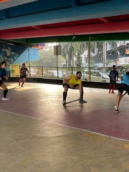 Players in a defensive formation during a rink hockey drill. We work extensively on tactical setups and team coordination.