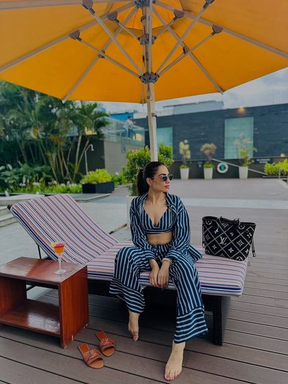 Another shot of my poolside look. Sunglasses and a good book are the only other accessories needed.