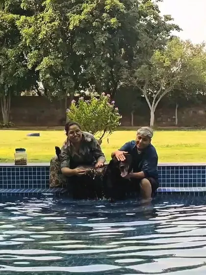 All smiles in the pool. This is a wonderful bonding moment for the whole family.