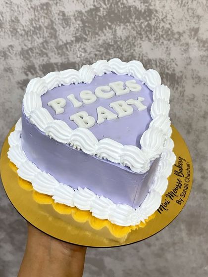 A custom heart-shaped "Pisces Baby" bento cake. I love making these zodiac themed cakes for birthdays. Let me know your sign and I can create one for you.