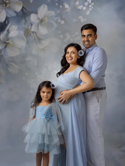 Welcoming a new baby is a family affair. I love including older siblings in maternity sessions to capture their excitement, creating a beautiful family portrait that documents this unique time before your family grows.