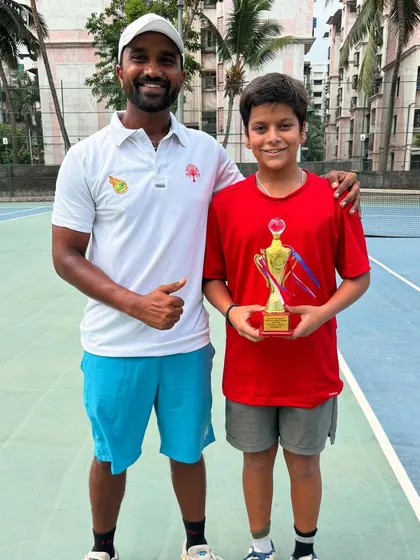 Abhinav Sharma with his coach after finishing as the Under-14 All India Championship Series Singles Runner-up in Panchkula.