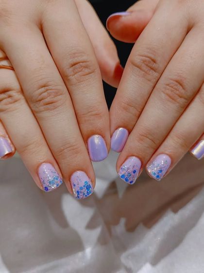 A different angle of the pretty lavender glitter and chrome nails.