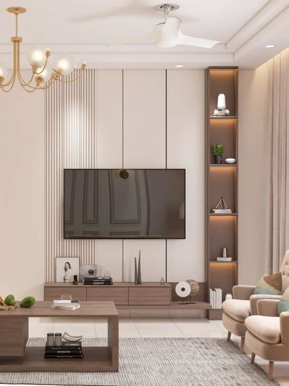 This living room is a study in modern comfort. We used a neutral color palette, a large sectional sofa, and built-in shelving with integrated lighting to create a space that is both stylish and highly functional.