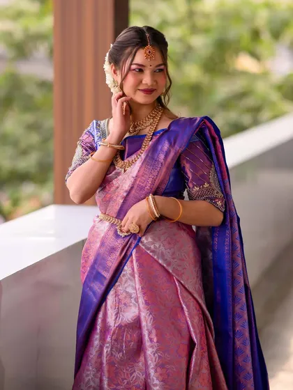 Another pose of the South Indian bride, highlighting the grace and beauty of the traditional attire.