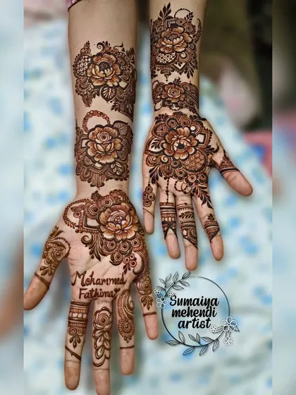 A beautiful floral design with a personalized name, 'Mohammed Fatima'.
