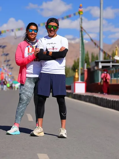 Posing with a finisher after the Ladakh Marathon. Running at the roof of the world is an incredible achievement, and I'm proud to guide athletes to this finish line.
