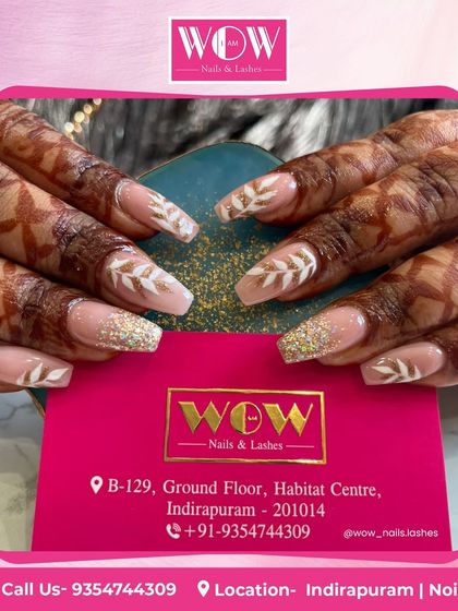 Perfect for a festive or bridal look, these extensions feature a soft, glittery base with hand-painted white leaf designs, beautifully complementing the intricate henna.